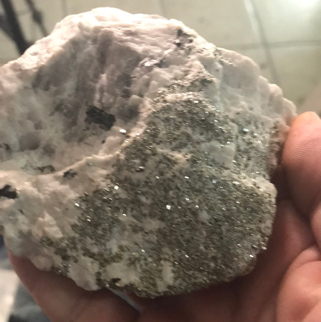 Kristen peacock ore pyrite and sesspartine garnet